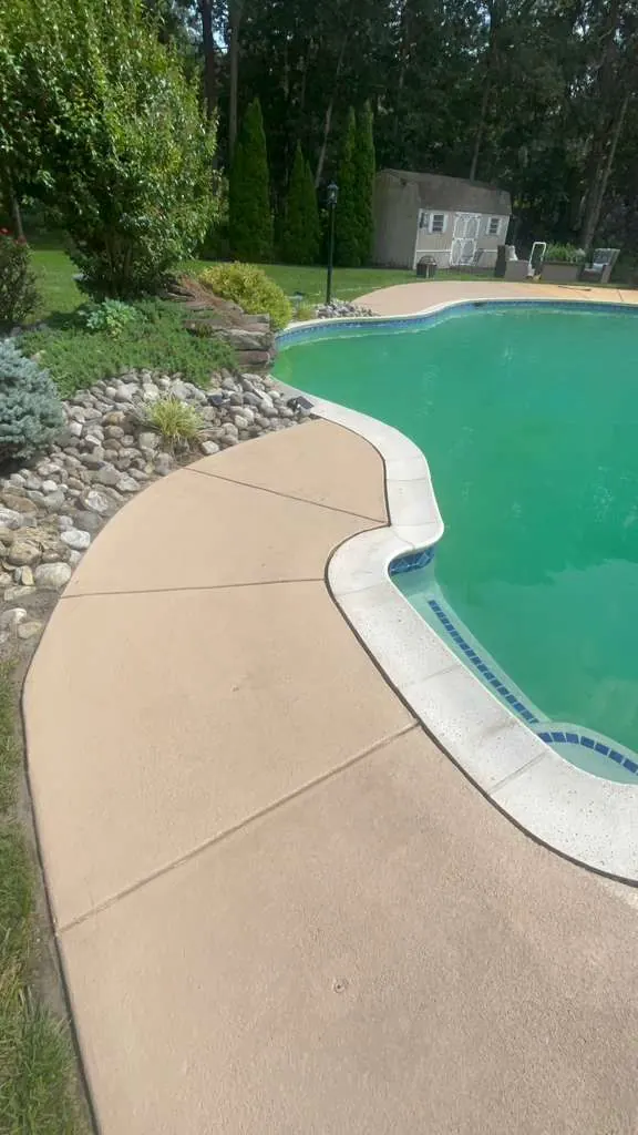 After pool deck refresh showing a cleaner and brighter surface